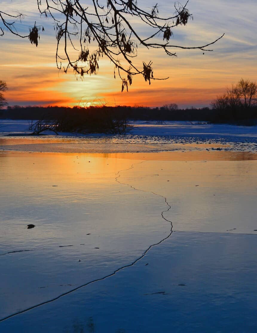 Frozen lake landscape sunset