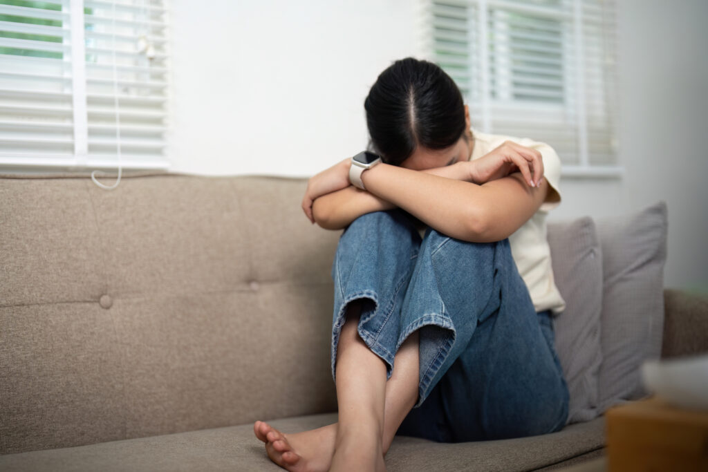 Psychologist and Patient. A patient in emotional distress seeking support from a psychologist in a therapy session.